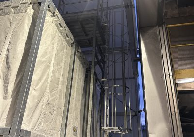 silo with safety cage ladder and maintenance walkway