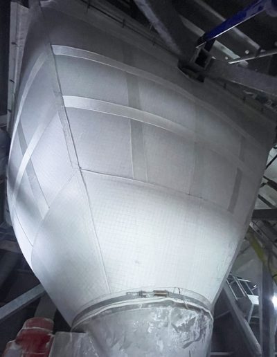 Flexible silo on metal structure