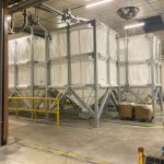 Flexible silos connected to the unloading network