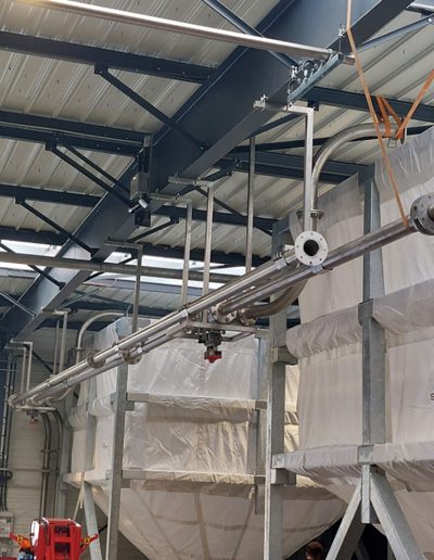 Transfer screw conveying to storage silos