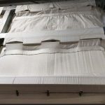 Installation of new canvas on existing silo structure