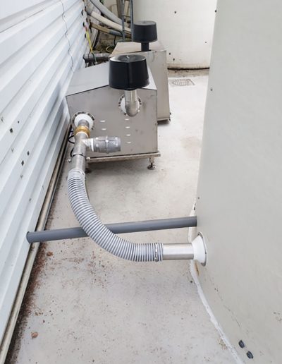 Pneumatic transfer system beneath a composite silo