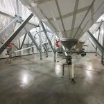 The silos are interconnected by flexible screws.